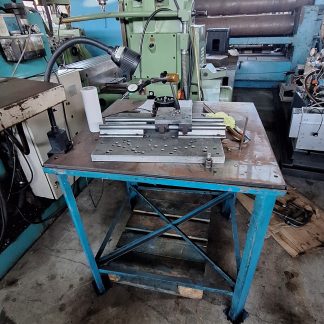 Plano metálico com micrometro